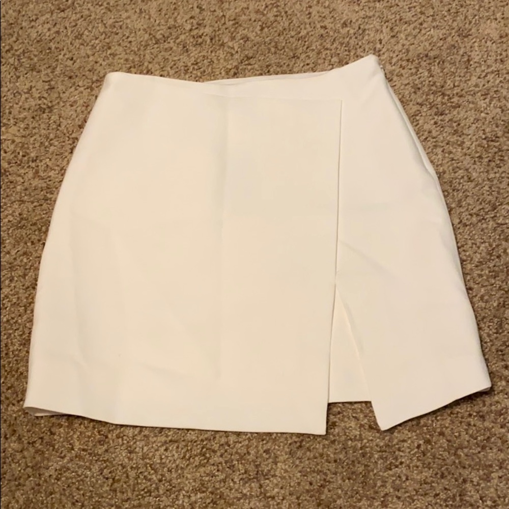Unworn white skirt with tags. Open to offers!